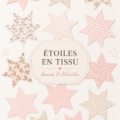 Tissu étoilé rose avec des motifs délicats, idéal pour des projets de décoration intérieure