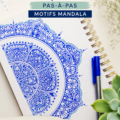Un mandala coloré dessiné sur papier, montrant des motifs complexes et harmonieux.